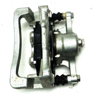 New NOS GM Rear Brake Caliper with Brake Pads, Wear Indicator 2006-10 Hummer H3T