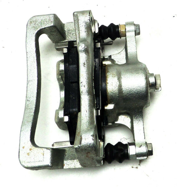 New NOS GM Rear Brake Caliper with Brake Pads, Wear Indicator 2006-10 Hummer H3T